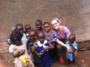 Namuwongo Janel with kids in Africa